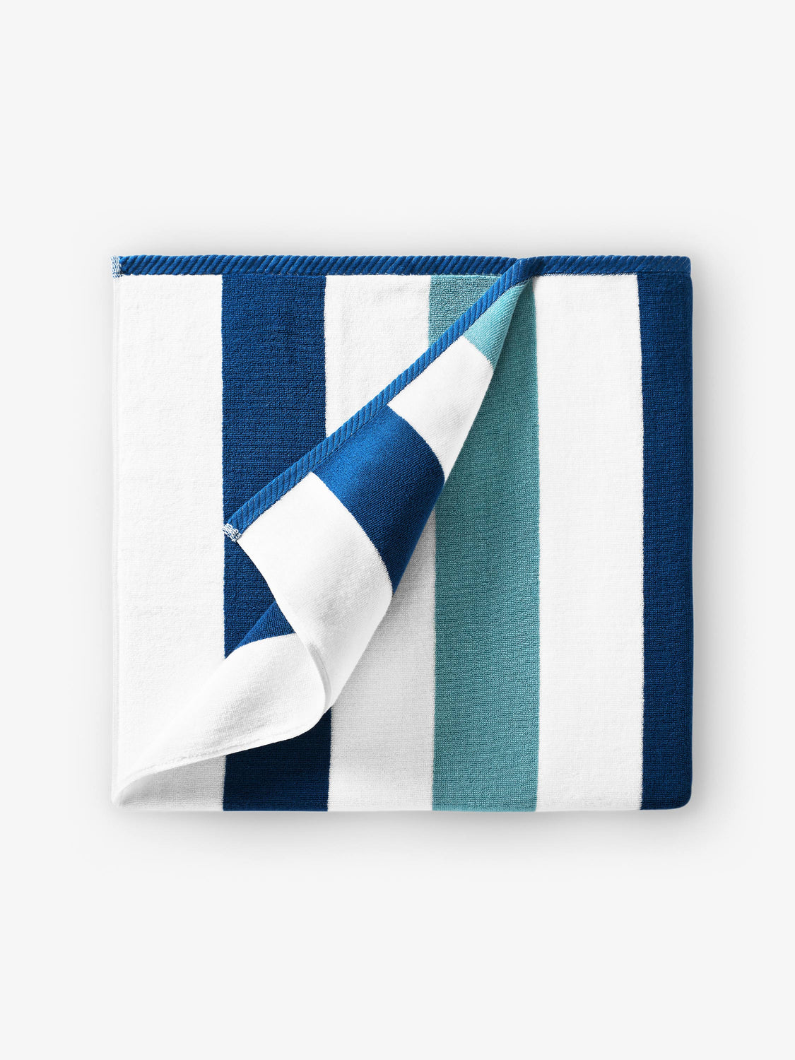 A folded blue, green, and white striped cabana beach towel.