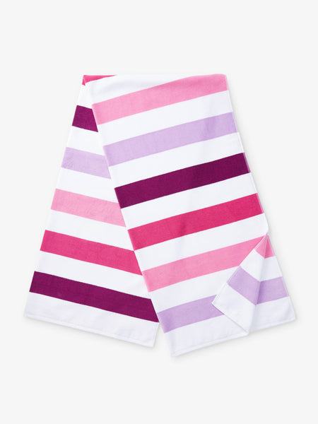 A folded pink, purple, and white striped cabana beach towel.