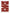 Oversized, hand-woven Mexican blanket in red with patterned designs and white fringe spread out.