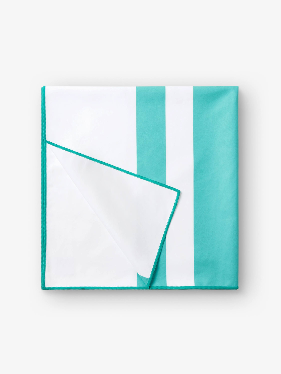 A folded quick drying, aqua blue and white striped microfiber beach towel.