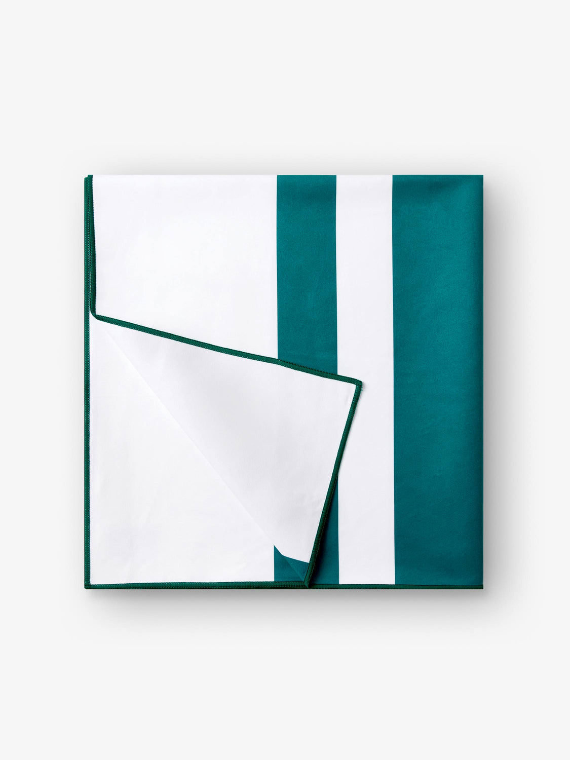 A folded quick drying, green and white striped microfiber beach towel.