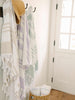 Three extra large striped Turkish towels—driftwood, purple, and green—hanging side by side.